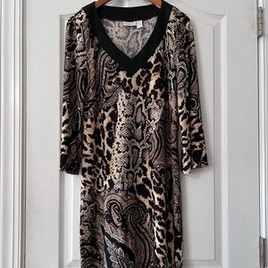 Chico’s v-neck dress. 3/4 sleeve Chico’s size 0 which is equivalent to a small/4